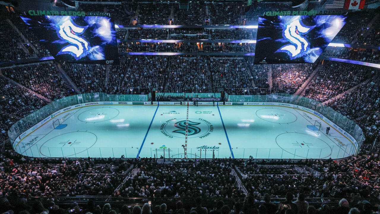 SEATTLE, WASHINGTON - OCTOBER 23: A general view of Climate Pledge Arena with the center ice logo prior to the Kraken's inaugural home opening game between the Seattle Kraken and the Vancouver Canucks on October 23, 2021 in Seattle, Washington.