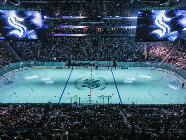 SEATTLE, WASHINGTON - OCTOBER 23: A general view of Climate Pledge Arena with the center ice logo prior to the Kraken's inaugural home opening game between the Seattle Kraken and the Vancouver Canucks on October 23, 2021 in Seattle, Washington.