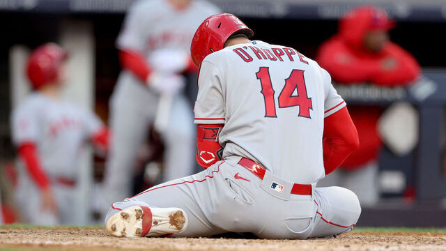 NEW YORK, NEW YORK - APRIL 20: Logan O'Hoppe #14 of the Los Angeles Angels falls injured as he is at home plate during his at bat in the ninth inning against the New York Yankees at Yankee Stadium on April 20, 2023 in the Bronx borough of New York City. The New York Yankees defeated the Los Angeles Angels 9-3.