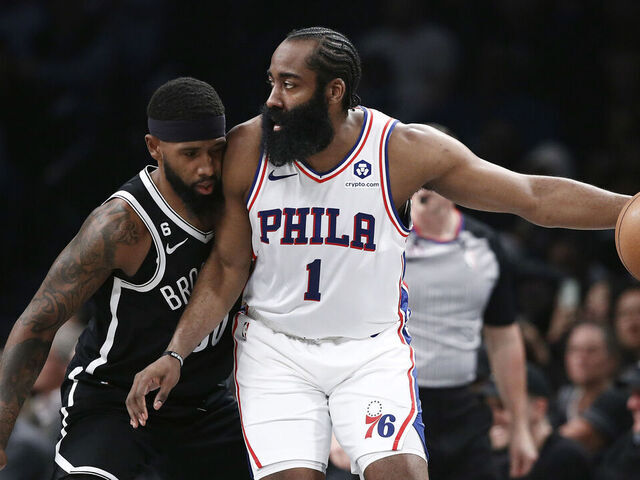 NEW YORK, NEW YORK - APRIL 20: James Harden #1 of the Philadelphia 76ers dribbles against Royce O'Neale #00 of the Brooklyn Nets during the first half of Game Three of the Eastern Conference First Round Playoffs at Barclays Center on April 20, 2023 in the Brooklyn borough of New York City.