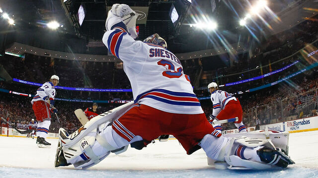 NEWARK, NJ - APRIL 20: Igor Shesterkin #31 of the New York Rangers makes a glove save during Game Two of the First Round of the 2023 Stanley Cup Playoffs against the New Jersey Devils at the Prudential Center on April 20, 2023 in Newark, New Jersey.