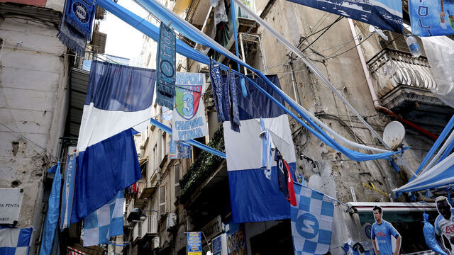 NAPLES, ITALY - APRIL 19: Old town streets in Quartieri Spagnoli district are festively decorated by fans to prepare for the probable victory of the third Scudetto in Napoli football team history on April 19, 2023 in Naples, Italy.