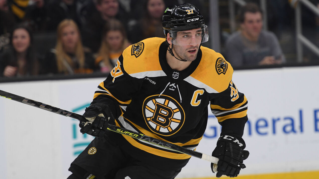 BOSTON, MASSACHUSETTS - MARCH 30: Patrice Bergeron #37 of the Boston Bruins skates against the Columbus Blue Jackets at the TD Garden on March 30, 2023 in Boston, Massachusetts.