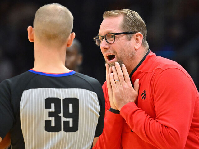 CLEVELAND, OHIO - DECEMBER 23: Head coach Nick Nurse of the Toronto Raptors reacts to a call from referee Tyler Ford #39 during the first half against the Cleveland Cavaliers at Rocket Mortgage Fieldhouse on December 23, 2022 in Cleveland, Ohio.