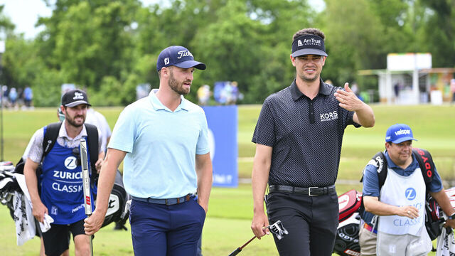 AVONDALE, LOUISIANA - APRIL 21: Beau Hossler and Wyndham Clark leave the ninth tee, their last, during the second round of the Zurich Classic of New Orleans at TPC Louisiana on April 21, 2023 in Avondale, Louisiana.