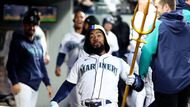 SEATTLE, WASHINGTON - APRIL 21: Teoscar Hernandez #35 of the Seattle Mariners celebrates his home run with the celebration trident during the fourth inning against the St. Louis Cardinals at T-Mobile Park on April 21, 2023 in Seattle, Washington.