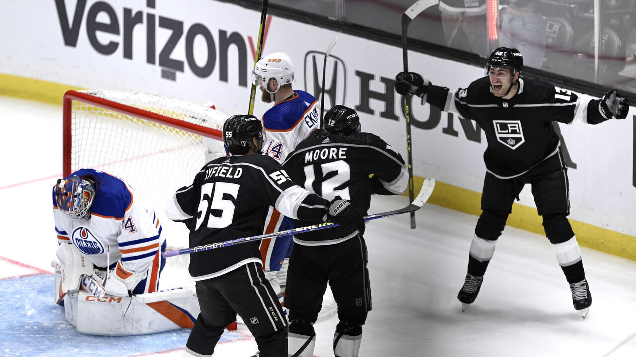 Los Angeles, Ca - April 21: Trevor Moore #12 of the Los Angeles Kings reacts with teammate Gabriel Vilardi #13 after scoring the game winning goal past goalie Stuart Skinner #74 of the Edmonton Oilers on a power play during overtime to win game 3 3-2 of a first round NHL Western Conference playoff hockey game at Crypto.com Arena in Los Angeles on Friday, April 21, 2023.