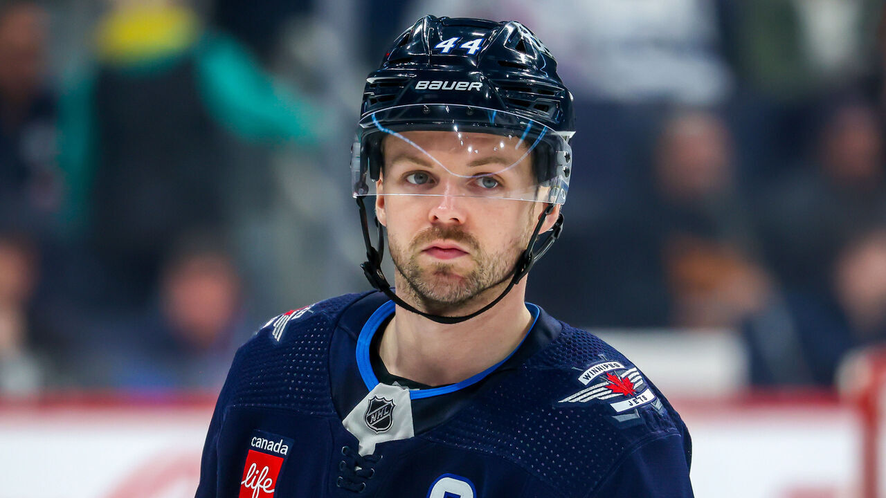 WINNIPEG, CANADA - APRIL 10: Josh Morrissey #44 of the Winnipeg Jets looks on during a third period stoppage of play against the San Jose Sharks at Canada Life Centre on April 10, 2023 in Winnipeg, Manitoba, Canada.