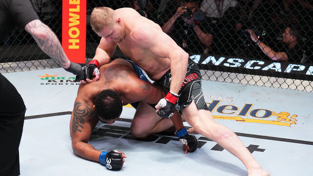 LAS VEGAS, NEVADA - APRIL 22: (R-L) Sergei Pavlovich of Russia punches Curtis Blaydes in a heavyweight fight during the UFC Fight Night event at UFC APEX on April 22, 2023 in Las Vegas, Nevada.