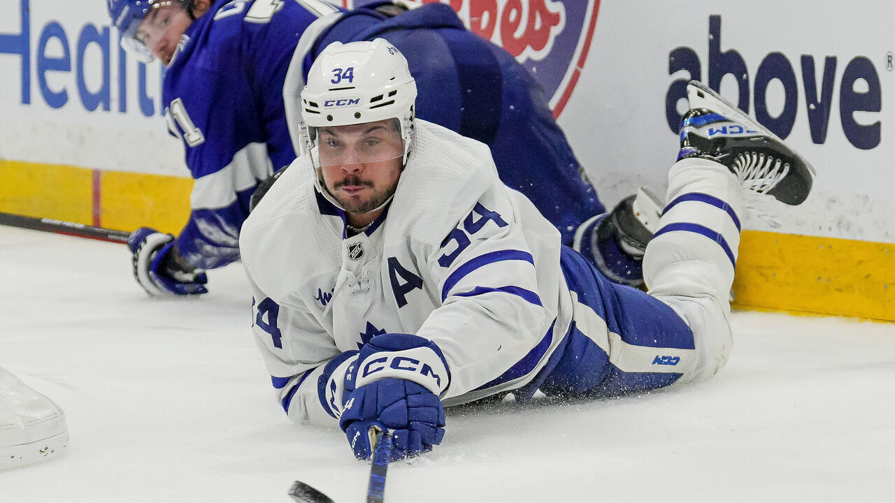 TAMPA, FL - APRIL 22: Toronto Maple Leafs center Auston Matthews (34) dives to make a pass from behind the net during the NHL first round 2023 playoffs game 3 Hockey match between the Tampa Bay Lightning and Toronto Maple Leafs on April 22nd 2023 at Amalie Arena in Tampa, FL.