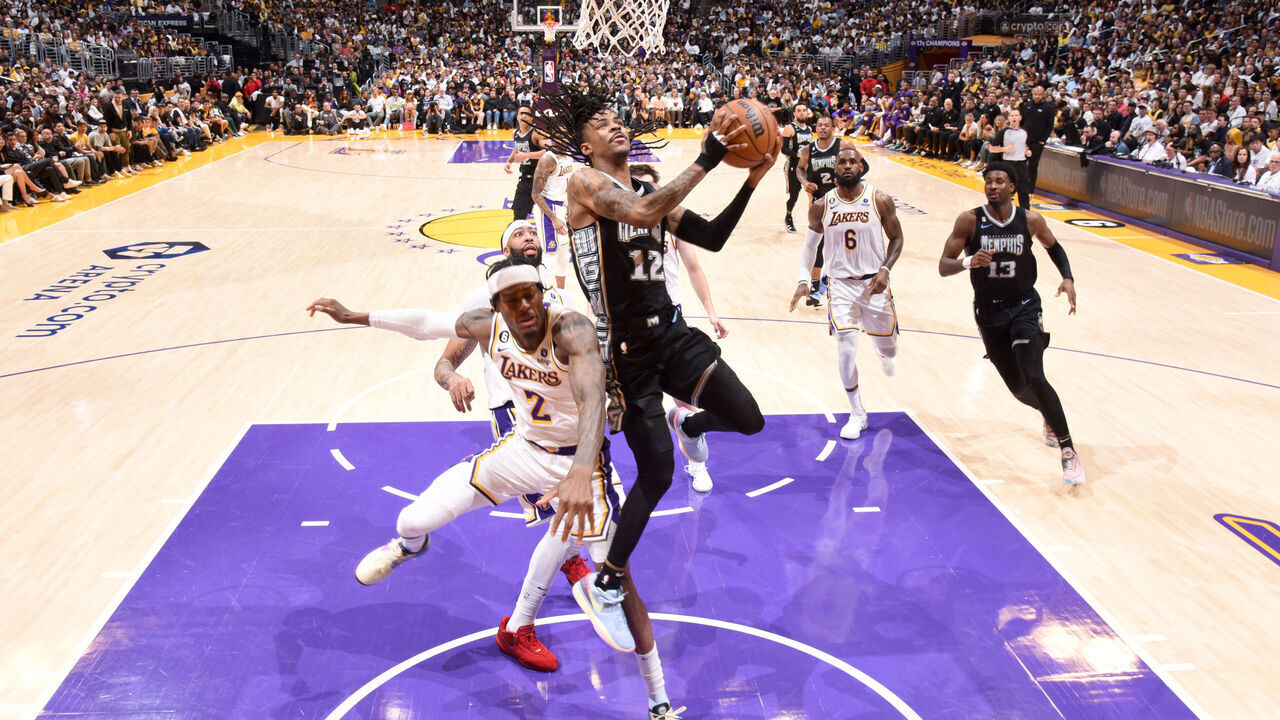 LOS ANGELES, CA - APRIL 22: Ja Morant #12 of the Memphis Grizzlies drives to the basket during Round 1 Game 3 of the 2023 NBA Playoffs on APRIL 22, 2023 at Crypto.Com Arena in Los Angeles, California. NOTE TO USER: User expressly acknowledges and agrees that, by downloading and/or using this Photograph, user is consenting to the terms and conditions of the Getty Images License Agreement. Mandatory Copyright Notice: Copyright 2023 NBAE