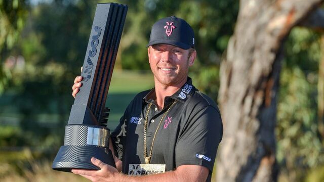Talor Gooch of the US poses with the trophy after winning the 2023 Liv Golf tournament in Adelaide on April 23, 2023.