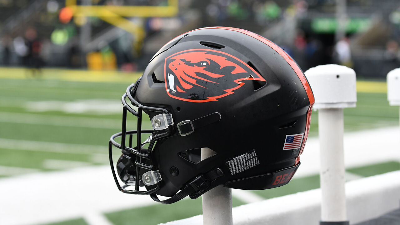 EUGENE, OR - NOVEMBER 27: An Oregon State helmet sits on the back of a bench during a PAC-12 conference football game between the Oregon State Beavers and Oregon Ducks on November 27, 2021 at Autzen Stadium in Eugene, Oregon.
