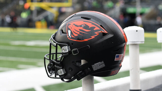 EUGENE, OR - NOVEMBER 27: An Oregon State helmet sits on the back of a bench during a PAC-12 conference football game between the Oregon State Beavers and Oregon Ducks on November 27, 2021 at Autzen Stadium in Eugene, Oregon.
