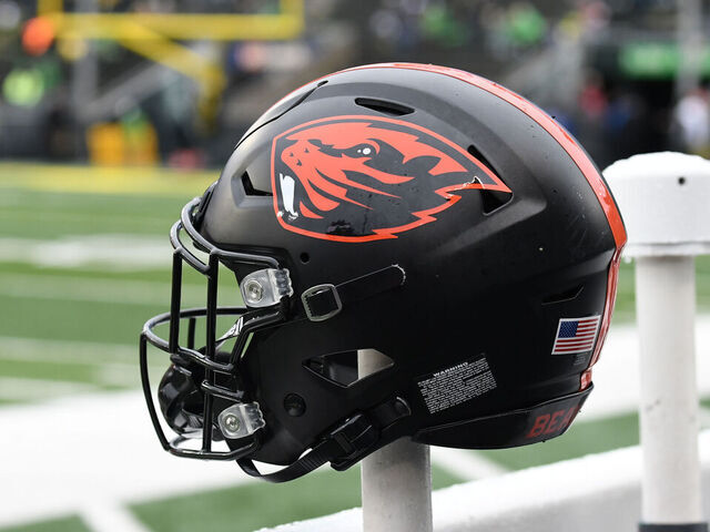EUGENE, OR - NOVEMBER 27: An Oregon State helmet sits on the back of a bench during a PAC-12 conference football game between the Oregon State Beavers and Oregon Ducks on November 27, 2021 at Autzen Stadium in Eugene, Oregon.