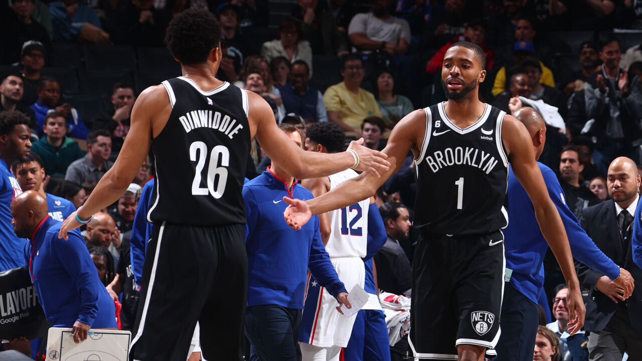 BROOKLYN, NY - APRIL 20: Spencer Dinwiddie #26 and Mikal Bridges #1 of the Brooklyn Nets high five during Round One Game Three of the 2023 NBA Playoffs against the Philadelphia 76ers on April 20, 2023 at Barclays Center in Brooklyn, New York. Mandatory Copyright Notice: Copyright 2023 NBAE