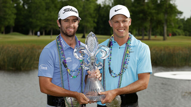 AVONDALE, LOUISIANA - APRIL 23: Davis Riley of the United States and Nick Hardy of the United States pose with the trophy and commemorative belts after their win during the final round of the Zurich Classic of New Orleans at TPC Louisiana on April 23, 2023 in Avondale, Louisiana.
