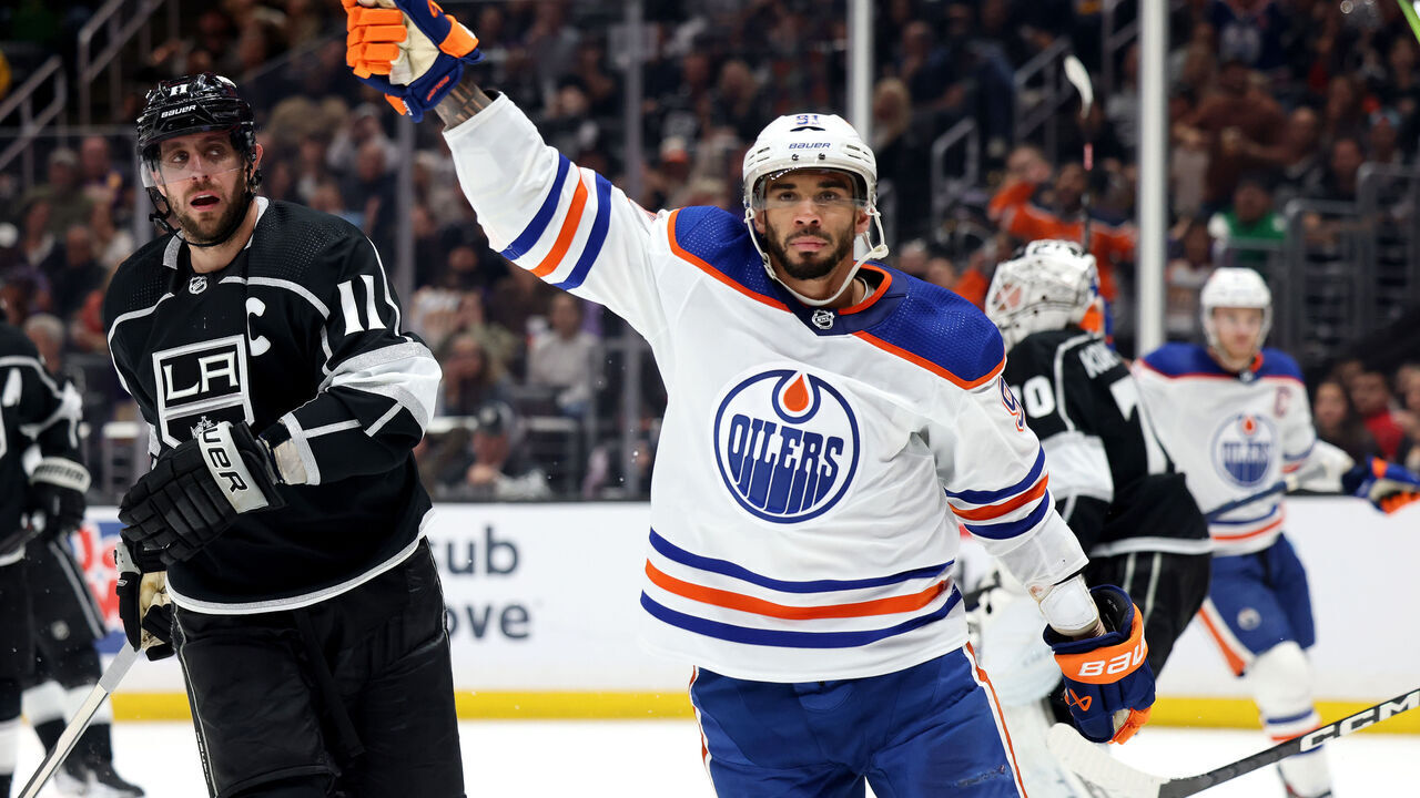 LOS ANGELES, CALIFORNIA - APRIL 23: Evander Kane #91 of the Edmonton Oilers reacts to his goal in front of Anze Kopitar #11 of the Los Angeles Kings, to tie the game 3-3, during the third period in Game Four of the First Round of the 2023 Stanley Cup Playoffs at Crypto.com Arena on April 23, 2023 in Los Angeles, California.