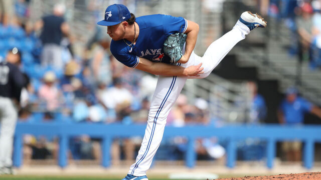 DUNEDIN, FL - FEBRUARY 26: Toronto Blue Jays Pitcher Nate Pearson (24) delivers a pitch to the plate during the spring training game between the New York Yankees and the Toronto Blue Jays on February 26, 2023, at the TD Ballpark in Dunedin, FL.