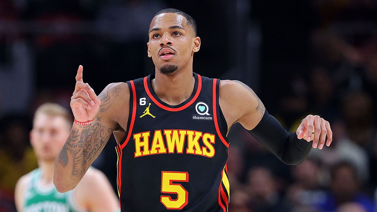 ATLANTA, GEORGIA - APRIL 23: Dejounte Murray #5 of the Atlanta Hawks reacts after drawing a foul on a basket against the Boston Celtics during the first quarter of Game Four of the Eastern Conference First Round Playoffs at State Farm Arena on April 23, 2023 in Atlanta, Georgia.