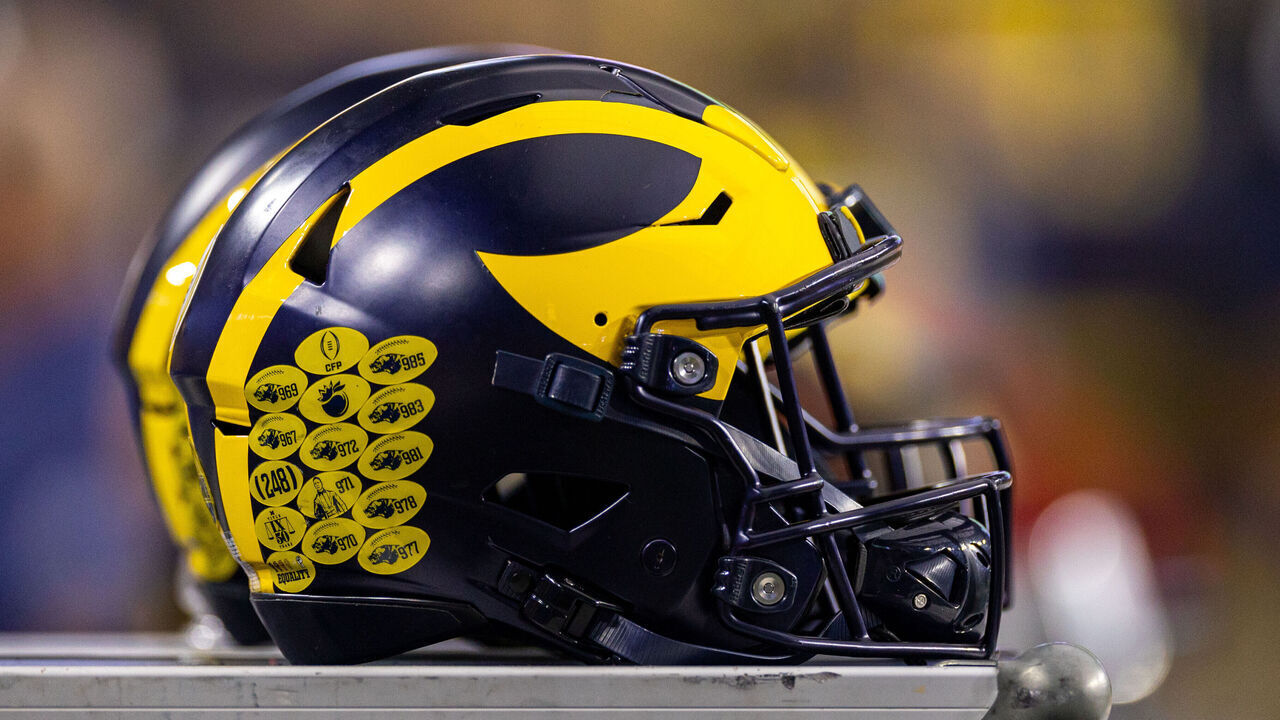 GLENDALE, AZ - DECEMBER 31: A Michigan helmet sits on the sideline during the Vrbo Fiesta Bowl between the Michigan Wolverines and the TCU Horned Frogs on Saturday, December 31st, 2022 at State Farm Stadium in Glendale, AZ