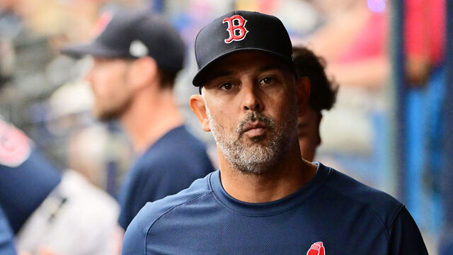 ST PETERSBURG, FLORIDA - APRIL 13: Manager Alex Cora #21 of the Boston Red Sox looks on during a game against the Tampa Bay Rays at Tropicana Field on April 13, 2023 in St Petersburg, Florida.