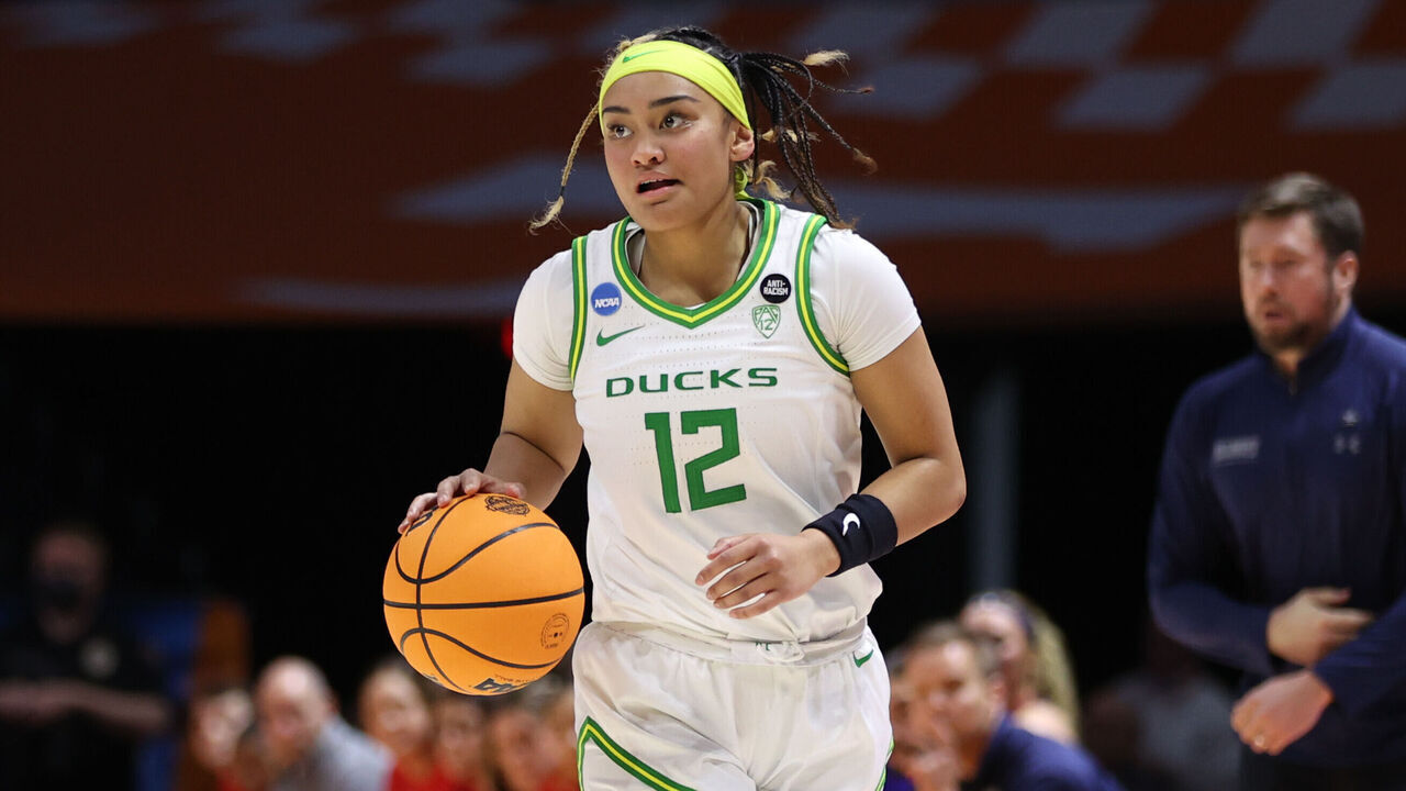 KNOXVILLE, TN - MARCH 19: Te-Hina Paopao #12 of the Oregon Ducks brings the ball up court against the Belmont Bruins during the first round of the 2022 NCAA Women's Basketball Tournament held at Thompson-Boling Arena on March 19, 2022 in Knoxville, Tennessee.