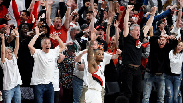 PORTLAND, OREGON - APRIL 23: Damian Lillard #0 of the Portland Trail Blazers waves goodbye to the Oklahoma City Thunder after hitting a last second 37 foot game winner to end Game Five of the Western Conference quarterfinals during the 2019 NBA Playoffs at Moda Center on April 23, 2019 in Portland, Oregon. The Blazers won 118-115.