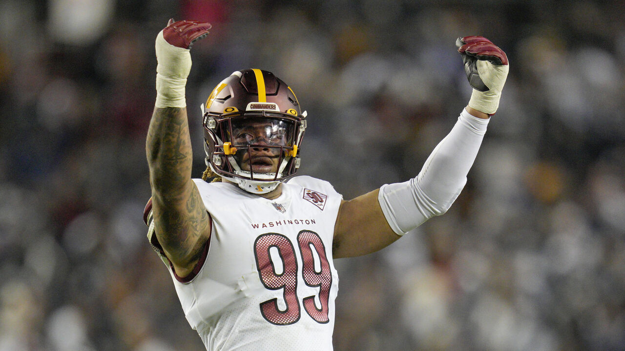 LANDOVER, MARYLAND - JANUARY 08: Chase Young #99 of the Washington Commanders gestures to fans during the first half of the team's game against the Dallas Cowboys at FedExField on January 08, 2023 in Landover, Maryland.