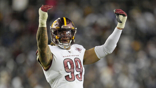 LANDOVER, MARYLAND - JANUARY 08: Chase Young #99 of the Washington Commanders gestures to fans during the first half of the team's game against the Dallas Cowboys at FedExField on January 08, 2023 in Landover, Maryland.