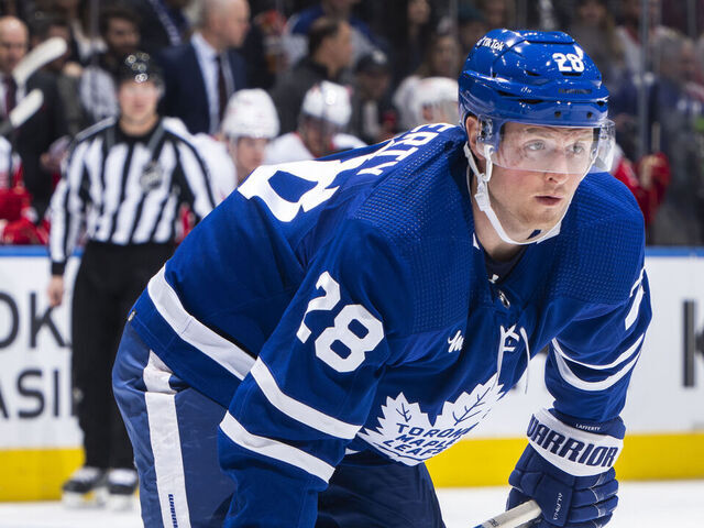 TORONTO, ON - APRIL 2: Sam Lafferty #28 of the Toronto Maple Leafs waits on a face off against the Detroit Red Wings during the first period at the Scotiabank Arena on April 2, 2023 in Toronto, Ontario, Canada.