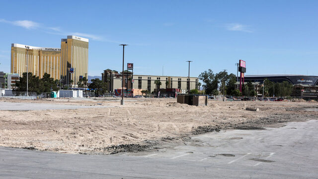 LAS VEGAS, NEVADA - APRIL 21: A view shows Mandalay Bay Resort and Casino and Delano Las Vegas (L) on the Las Vegas Strip and Allegiant Stadium (R), home of the NFL's Las Vegas Raiders, behind the site that the Oakland Athletics agreed in principle to purchase from Red Rock Resorts Inc. for a potential new ballpark on April 21, 2023 in Las Vegas, Nevada. The A's President Dave Kaval said the deal for the 49-acre plot of land, formerly the home of Wild Wild West Gambling Hall & Hotel, could be used to relocate the Major League Baseball franchise from Oakland to Las Vegas. The team will now work on a public-private partnership to build a USD 1.5 billion, 30,000-to-35,000-seat, partially retractable-roof stadium in time for the 2027 season.