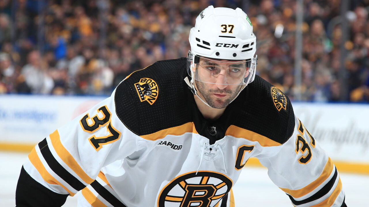 BUFFALO, NY - MARCH 19: Patrice Bergeron #37 of the Boston Bruins prepares for a faceoff against the Buffalo Sabres during an NHL game on March 19, 2023 at KeyBank Center in Buffalo, New York.