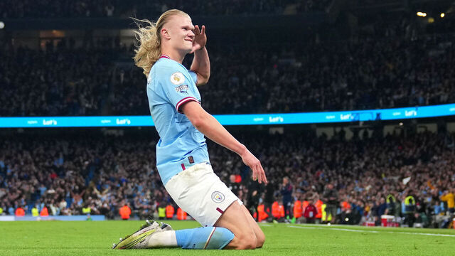 MANCHESTER, ENGLAND - APRIL 26: Erling Haaland of Manchester City celebrates after scoring the team's fourth goal during the Premier League match between Manchester City and Arsenal FC at Etihad Stadium on April 26, 2023 in Manchester, England.