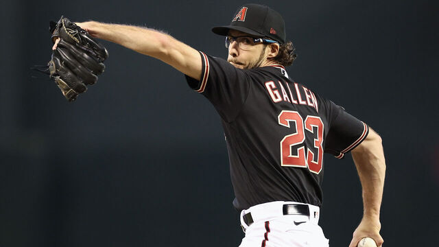PHOENIX, ARIZONA - APRIL 26: Starting pitcher Zac Gallen #23 of the Arizona Diamondbacks throws a warm-up pitch during the first inning of the MLB game against the Kansas City Royals at Chase Field on April 26, 2023 in Phoenix, Arizona.