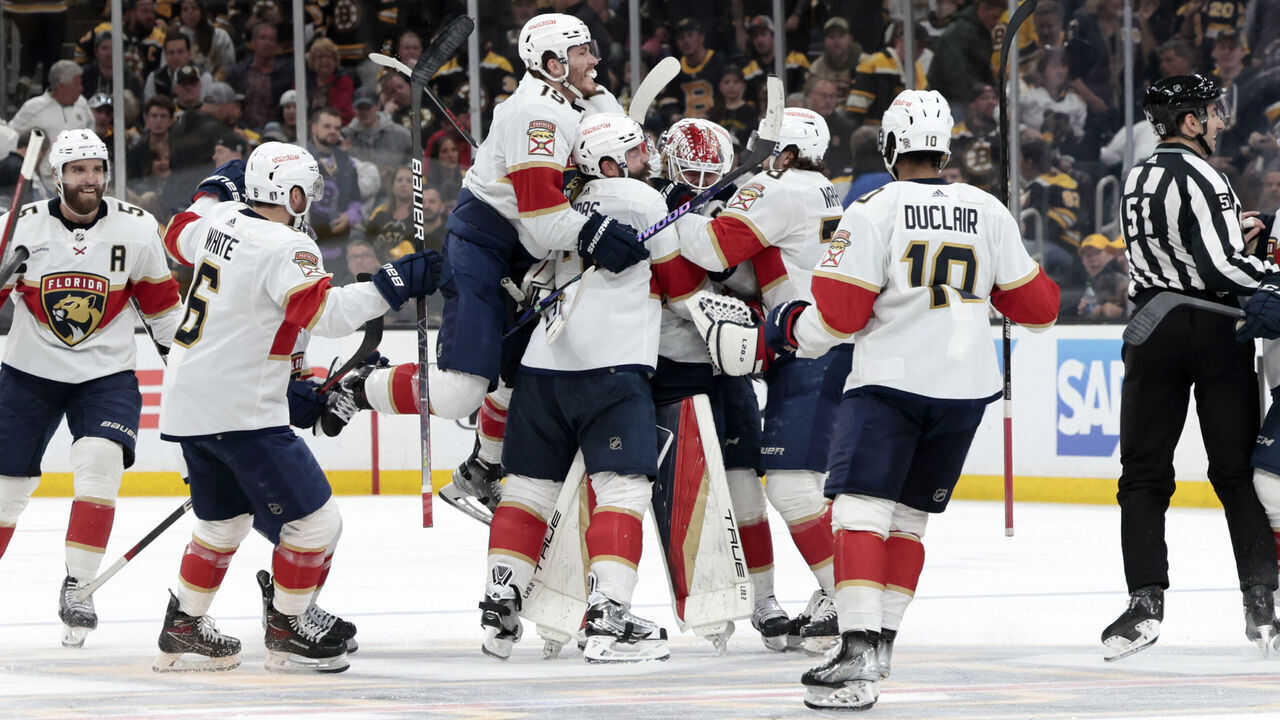 BOSTON, MA - APRIL 26: Florida Panthers right wing Matthew Tkachuk (19) and the Panthers swamp Florida Panthers goalie Sergei Bobrovsky (72) after Game 5 of an Eastern Conference First Round playoff contest between the Boston Bruins and the Florida Panthers on April 26, 2023, at TD Garden in Boston, Massachusetts.