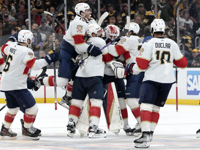 BOSTON, MA - APRIL 26: Florida Panthers right wing Matthew Tkachuk (19) and the Panthers swamp Florida Panthers goalie Sergei Bobrovsky (72) after Game 5 of an Eastern Conference First Round playoff contest between the Boston Bruins and the Florida Panthers on April 26, 2023, at TD Garden in Boston, Massachusetts.
