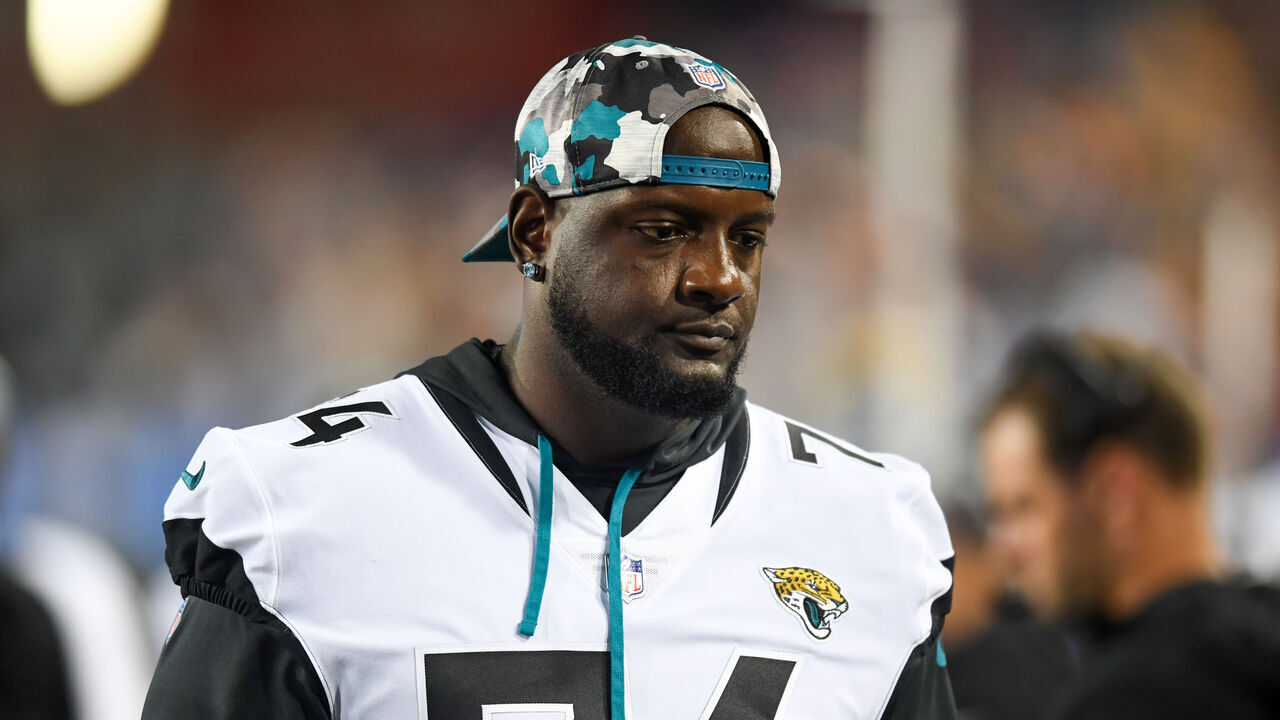 CANTON, OH - AUGUST 04: Cam Robinson #74 of the Jacksonville Jaguars looks on during the first half of the 2022 Pro Football Hall of Fame Game against the Las Vegas Raiders at Tom Benson Hall of Fame Stadium on August 04, 2022 in Canton, Ohio.