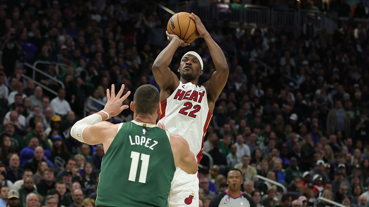 MILWAUKEE, WISCONSIN - APRIL 26: Jimmy Butler #22 of the Miami Heat shoots over Brook Lopez #11 of the Milwaukee Bucks during the second half of Game 5 of the Eastern Conference First Round Playoffs at Fiserv Forum on April 26, 2023 in Milwaukee, Wisconsin.