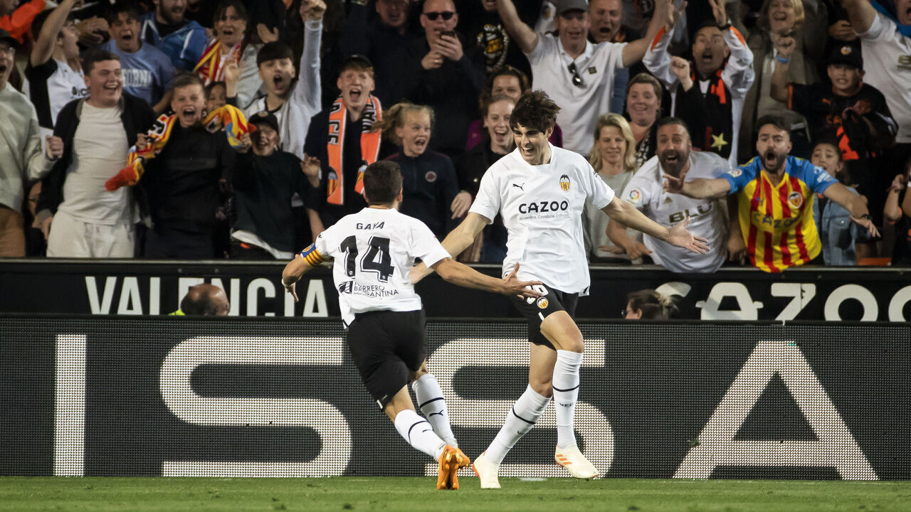 Javi Guerra (R) of Valencia cf celebrate after scoring the 2-1 goal with his teammate Jose Luis Gaya of Valencia CF (L) during La Liga match between Valencia CF and Real Valladolid at Mestalla Stadium on April 27, 2023.