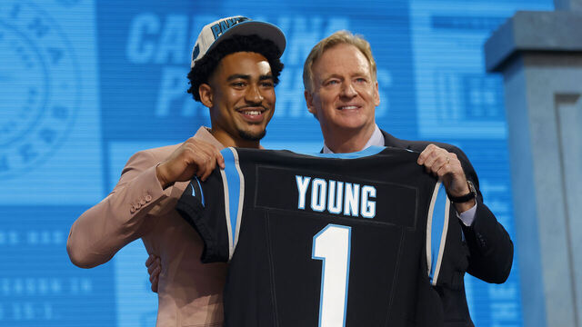 KANSAS CITY, MISSOURI - APRIL 27: (L-R) Bryce Young poses with NFL Commissioner Roger Goodell after being selected first overall by the Carolina Panthers during the first round of the 2023 NFL Draft at Union Station on April 27, 2023 in Kansas City, Missouri.