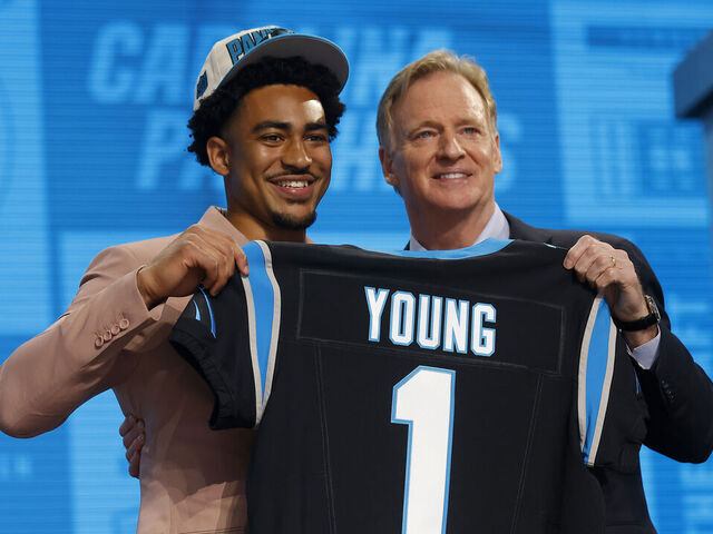 KANSAS CITY, MISSOURI - APRIL 27: (L-R) Bryce Young poses with NFL Commissioner Roger Goodell after being selected first overall by the Carolina Panthers during the first round of the 2023 NFL Draft at Union Station on April 27, 2023 in Kansas City, Missouri.