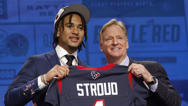 KANSAS CITY, MISSOURI - APRIL 27: (L-R) C.J. Stroud poses NFL Commissioner Roger Goodell after being selected second overall by the Houston Texans during the first round of the 2023 NFL Draft at Union Station on April 27, 2023 in Kansas City, Missouri.