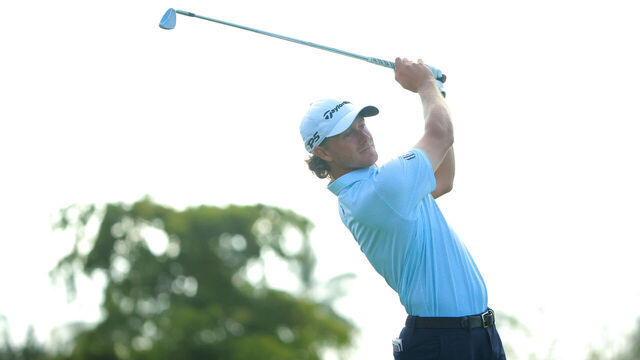 PUERTO VALLARTA, MEXICO - APRIL 27: Austin Smotherman plays a shot on the 13th hole of the United States putts on the green of the 12th hole during the first round of the Mexico Open at Vidanta at Vidanta Vallarta on April 27, 2023 in Puerto Vallarta, Jalisco.