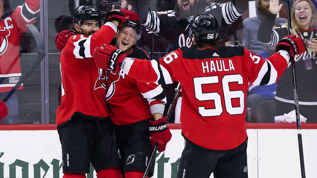 NEWARK, NJ - APRIL 27: New Jersey Devils left wing Ondrej Palat (18) celebrates with New Jersey Devils defenseman Jonas Siegenthaler (71), and New Jersey Devils left wing Erik Haula (56) after scoring a goal during the National Hockey League game between the New York Rangers and the New Jersey Devils on April 27, 2023 at Prudential Center in Newark, NJ.