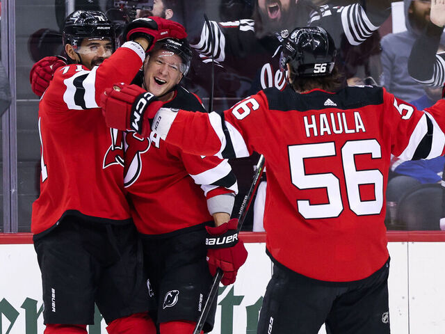 NEWARK, NJ - APRIL 27: New Jersey Devils left wing Ondrej Palat (18) celebrates with New Jersey Devils defenseman Jonas Siegenthaler (71), and New Jersey Devils left wing Erik Haula (56) after scoring a goal during the National Hockey League game between the New York Rangers and the New Jersey Devils on April 27, 2023 at Prudential Center in Newark, NJ.