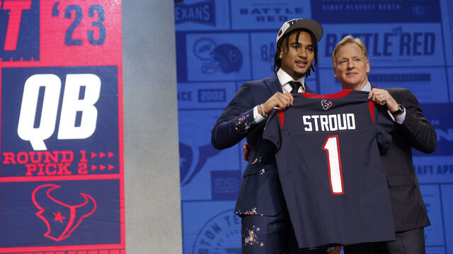 KANSAS CITY, MISSOURI - APRIL 27: (L-R) C.J. Stroud poses NFL Commissioner Roger Goodell after being selected second overall by the Houston Texans during the first round of the 2023 NFL Draft at Union Station on April 27, 2023 in Kansas City, Missouri.