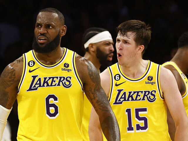 LOS ANGELES, CALIFORNIA - APRIL 24: LeBron James #6 and Austin Reaves #15 of the Los Angeles Lakers react against the Memphis Grizzlies in overtime of Game Four of the Western Conference First Round Playoffs at Crypto.com Arena on April 24, 2023 in Los Angeles, California. NOTE TO USER: User expressly acknowledges and agrees that, by downloading and/or using this photograph, user is consenting to the terms and conditions of the Getty Images License Agreement.