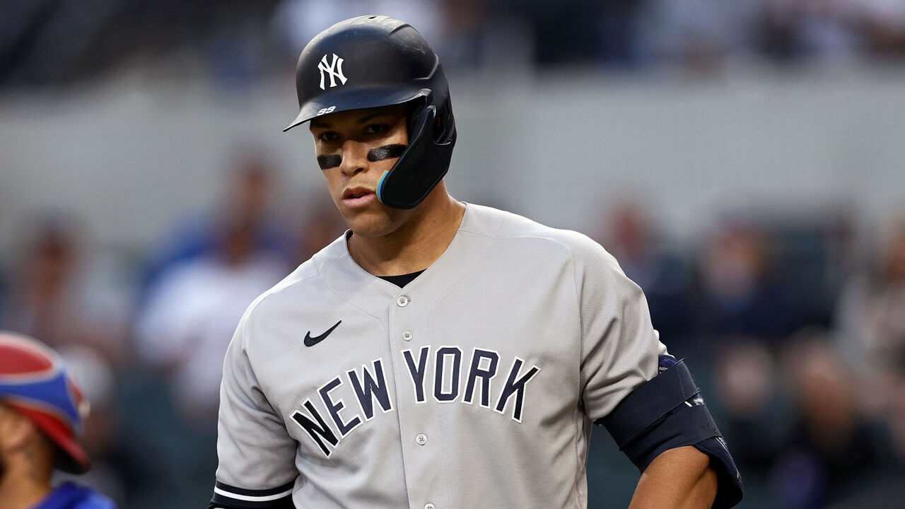 ARLINGTON, TEXAS - APRIL 27: Aaron Judge #99 of the New York Yankees reacts after striking out against the Texas Rangers in the top of the second inning at Globe Life Field on April 27, 2023 in Arlington, Texas.