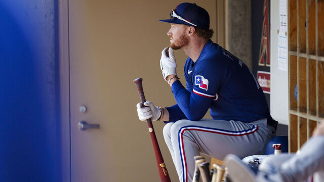SCOTTSDALE, AZ - MARCH 06: Clint Frazier #77 of the Texas Rangers looks on prior to a spring training game against the Colorado Rockies at Salt River Fields at Talking Stick on March 6, 2023 in Scottsdale, Arizona.